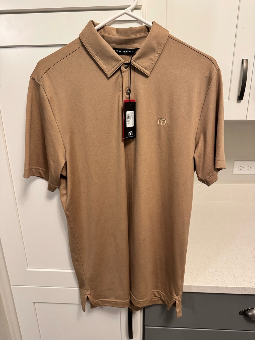 Travis Mathew Men's Tan Polo Shirt.. New w/ tags & Men’s Medium